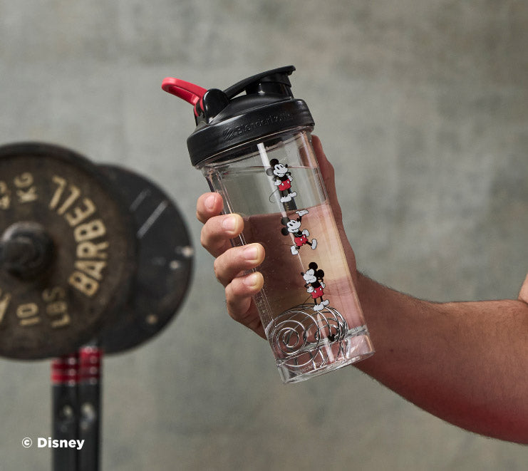 pro-series-u2 Mickey_Mouse_Protein_Shaker_Bottle_Being_Held_In_the_Gym.jpg